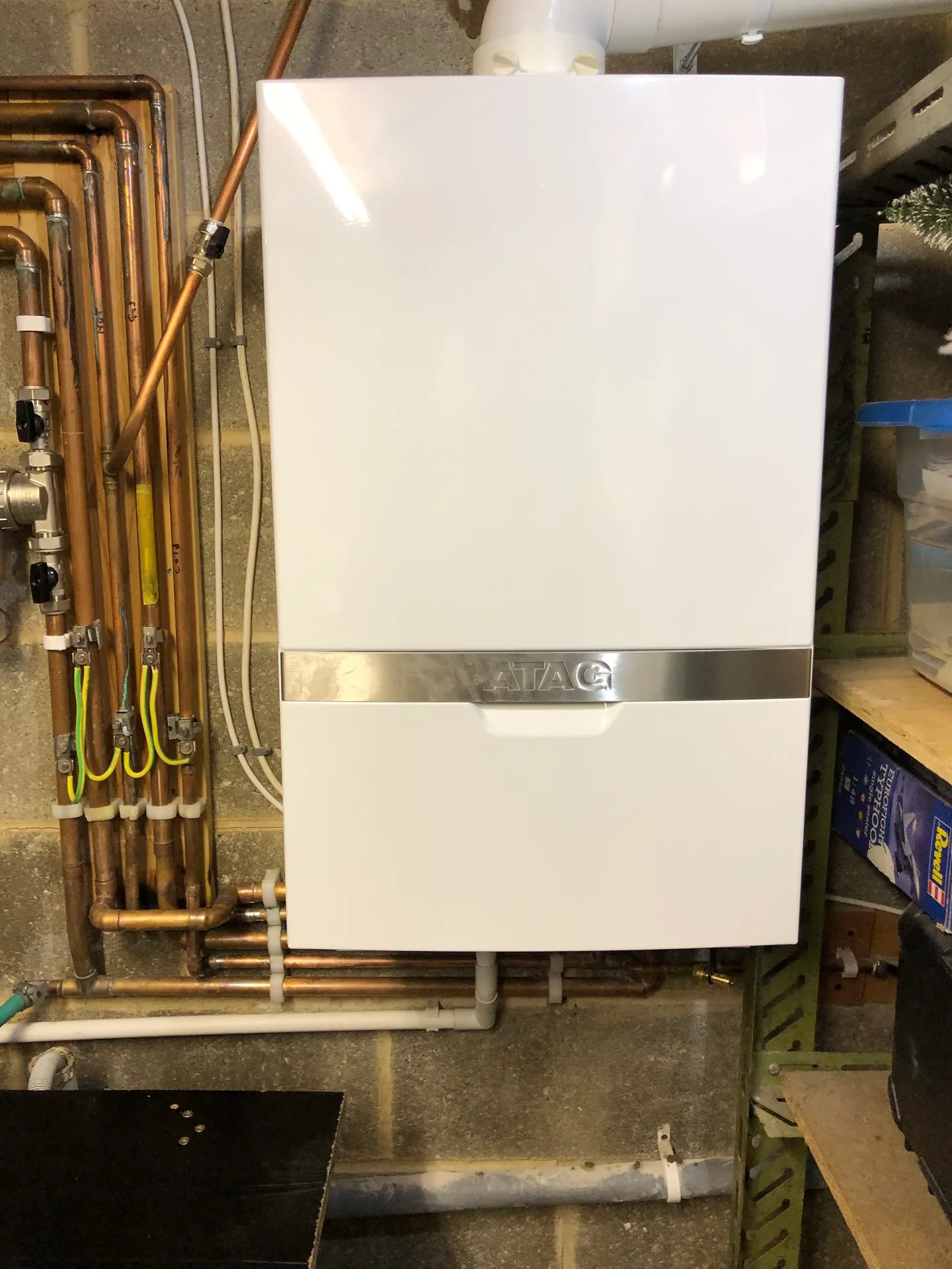 ATAG boiler with neatly arranged copper pipework installed by BRP Plumbing